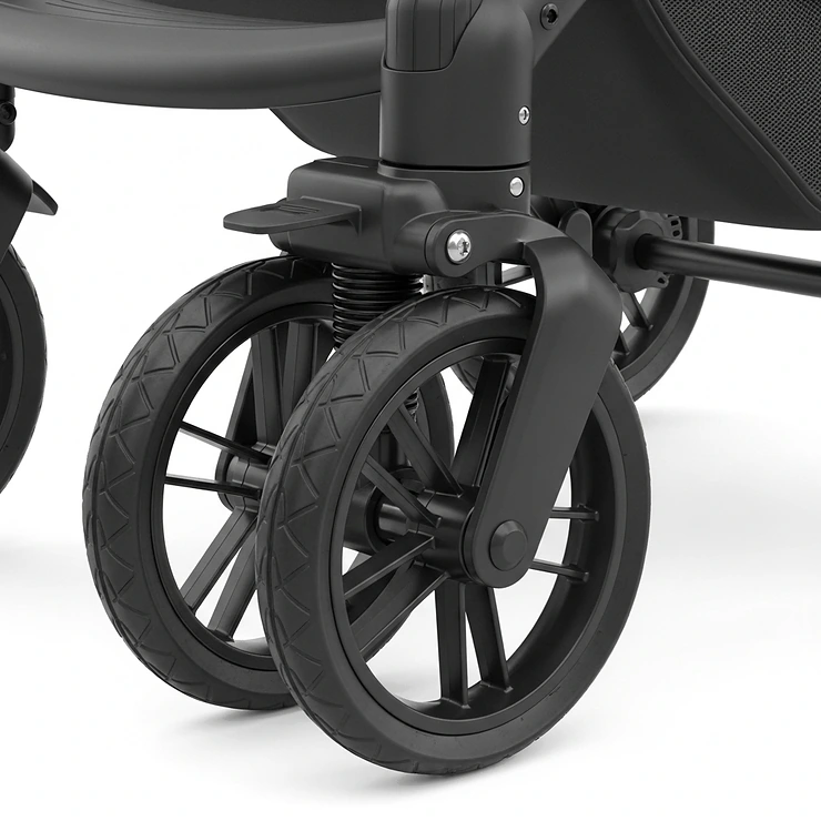Durable, all-terrain wheels of a single to double stroller, emphasizing smooth navigation on various surfaces.