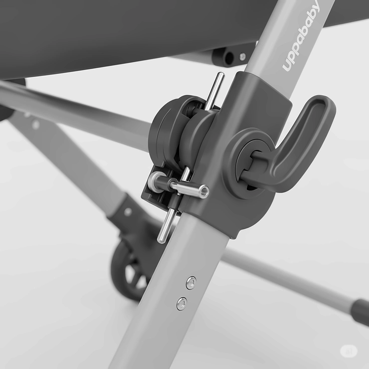 Detailed view of the secure locking mechanism on the UPPAbaby bassinet stand, ensuring the bassinet is safely attached for peace of mind.