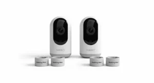 A clean product shot of the Nanit Pro Camera Twin Pack, including two cameras and two sets of breathing wear. This showcases one of the best baby monitors for twins with advanced smart features.