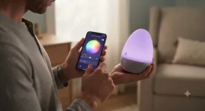 A parent using a smartphone app to adjust color and brightness on a smart baby lamp
