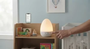 A dual touch and app-controlled baby night light designed for a toddler's room